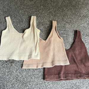 3 cropped tanks